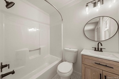 Tucked away on a beautifully wooded and private lot, this - photo 19