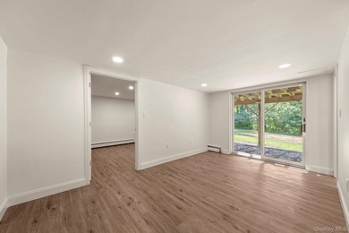 Tucked away on a beautifully wooded and private lot, this - photo 25
