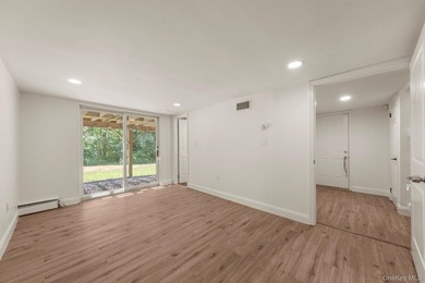 Tucked away on a beautifully wooded and private lot, this - photo 26