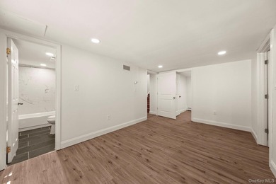 Tucked away on a beautifully wooded and private lot, this - photo 27