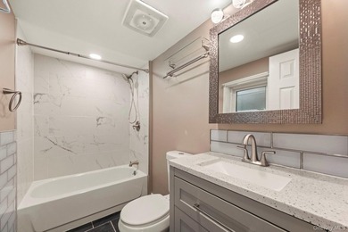 Tucked away on a beautifully wooded and private lot, this - photo 28
