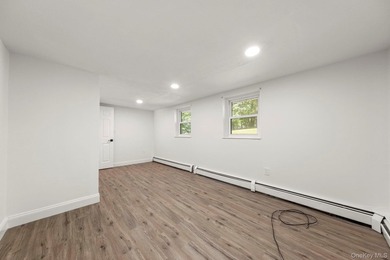 Tucked away on a beautifully wooded and private lot, this - photo 32
