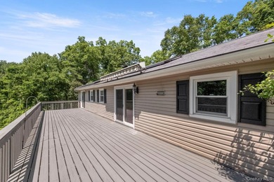 Tucked away on a beautifully wooded and private lot, this - photo 36