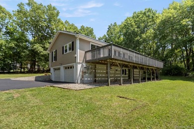Tucked away on a beautifully wooded and private lot, this - photo 39