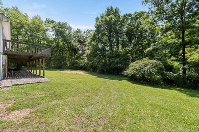 Tucked away on a beautifully wooded and private lot, this - photo 40