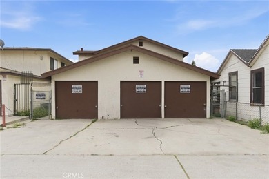 This well-cared for triplex is perched above the street and is - photo 10