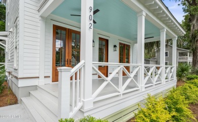 Experience historic Lowcountry elegance in this new 4-bed, 3