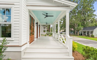 Experience historic Lowcountry elegance in this new 4-bed, 3