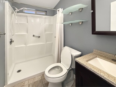 RIVERFRONT living in this beautifully maintained 2-bedroom cabin - photo 11