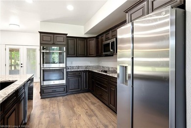 Wake up to beautiful views of Lake Tenkiller from the comfort of - photo 15
