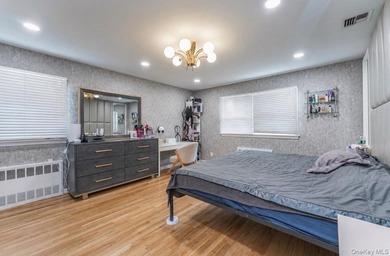 Welcome to this stunning 6-bedroom, 3.5-bath home on a beautiful - photo 10