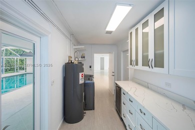 Discover this captivating residence at 145 S Prospect Dr, Miami - photo 12