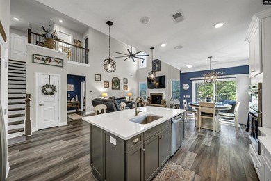 Drive your golf cart to the lake from this beautiful 3Br, 2 1/2