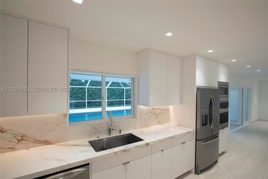 Discover this captivating residence at 145 S Prospect Dr, Miami - photo 14