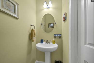 Drive your golf cart to the lake from this beautiful 3Br, 2 1/2