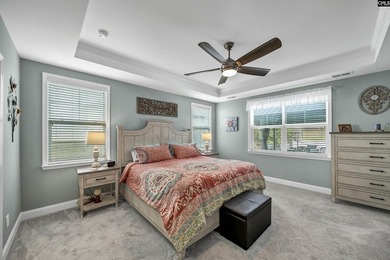 Drive your golf cart to the lake from this beautiful 3Br, 2 1/2