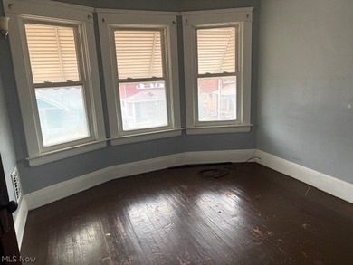 Unlock the potential at 521 E 112th St, Cleveland, Ohio 44108 - photo 5