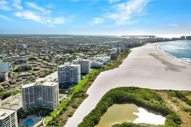 Welcome to coastal luxury at its finest in this exceptional