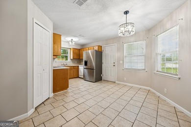 Welcome home to this well-maintained 3-bedroom, 2-bath residence - photo 6