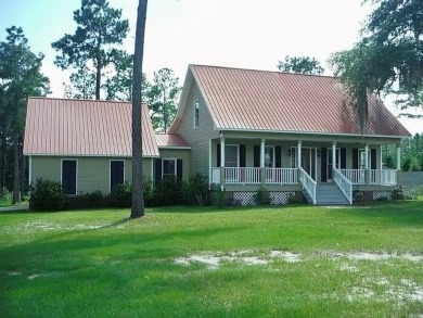 Lake Home For Sale in Ochlocknee, Georgia