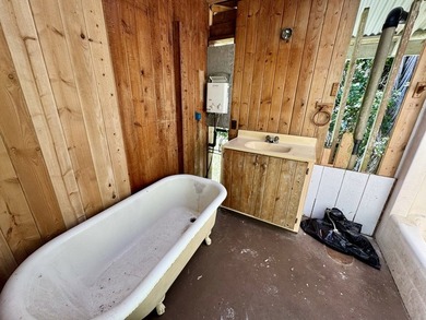 Welcome to this charming redwood and cedar home nestled in the - photo 22