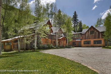 Set along the banks of picturesque Castle Creek, this remarkable - photo 2