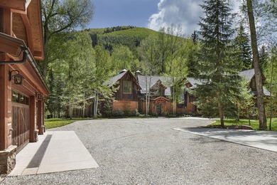 Set along the banks of picturesque Castle Creek, this remarkable - photo 3