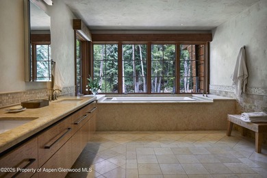 Set along the banks of picturesque Castle Creek, this remarkable - photo 10