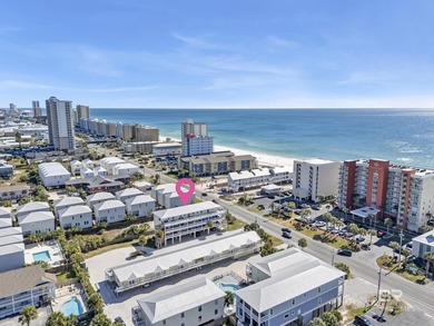 Beachside living made easy! This updated 2BR/1BA condo sits - photo 1