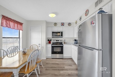 Beachside living made easy! This updated 2BR/1BA condo sits - photo 6