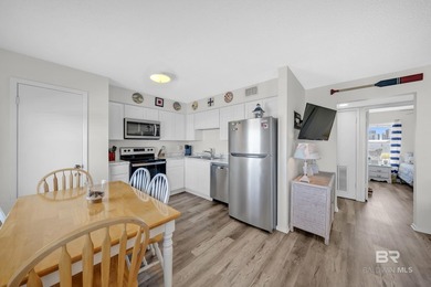 Beachside living made easy! This updated 2BR/1BA condo sits - photo 7