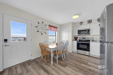 Beachside living made easy! This updated 2BR/1BA condo sits - photo 8