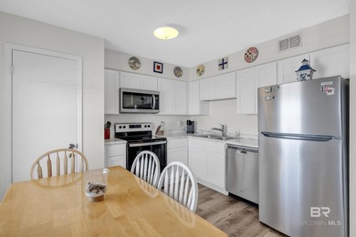 Beachside living made easy! This updated 2BR/1BA condo sits - photo 9
