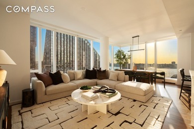 Residence 15J is a sun-flooded and stunning corner two bedroom - photo 2
