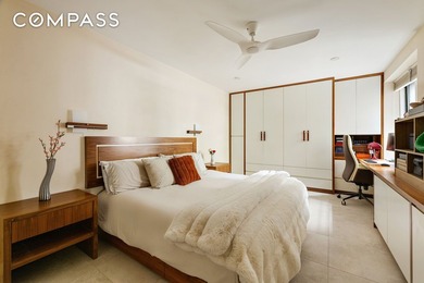 Step into the epitome of sophisticated city living at 30 E 9th - photo 7