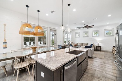 Created with entertaining in mind, this stunning three-story - photo 12