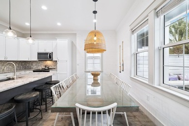 Created with entertaining in mind, this stunning three-story - photo 15