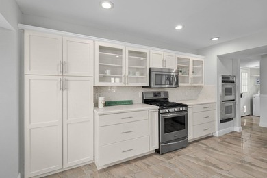 Experience refined coastal living in this stunning Tudor-style - photo 15