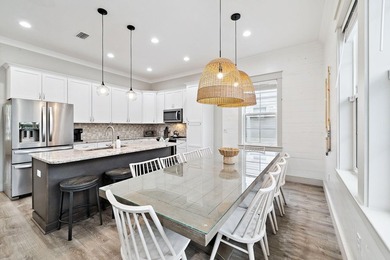Created with entertaining in mind, this stunning three-story - photo 16