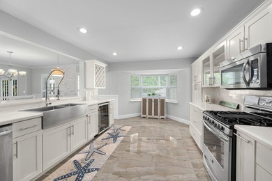 Experience refined coastal living in this stunning Tudor-style - photo 16