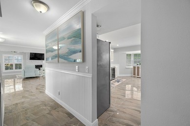 Experience refined coastal living in this stunning Tudor-style - photo 18