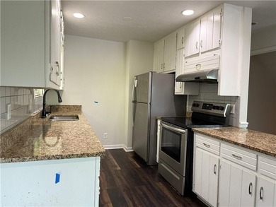 Welcome to this charming 3-bedroom, 2-bath home located just - photo 5