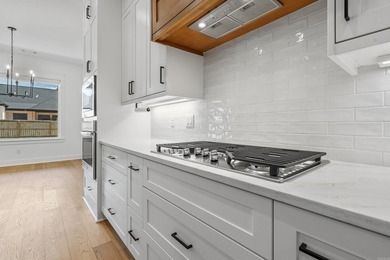 Discover luxury lake area living in the highly sought after - photo 13