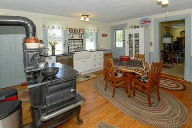 Welcome to the beautifully maintained historic farmhouse you - photo 17