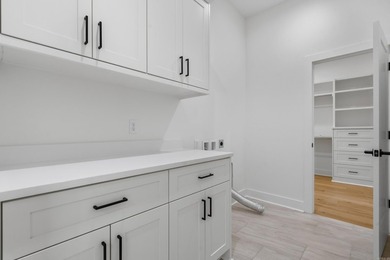 Discover luxury lake area living in the highly sought after - photo 39