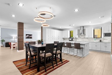 Fully gated and completely rebuilt in 2022, this modern home - photo 8