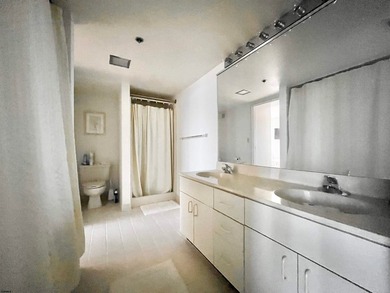 Spacious 1-bedroom high-rise condo with large windows in both - photo 5