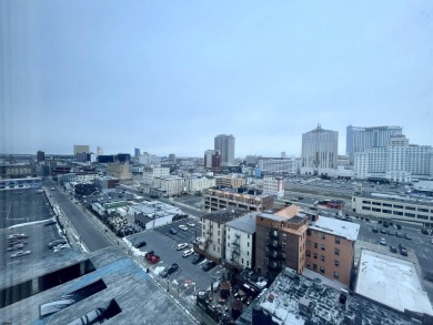 Spacious 1-bedroom high-rise condo with large windows in both