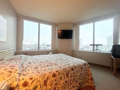 Spacious 1-bedroom high-rise condo with large windows in both - photo 7