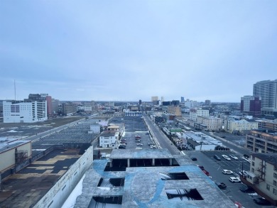 Spacious 1-bedroom high-rise condo with large windows in both